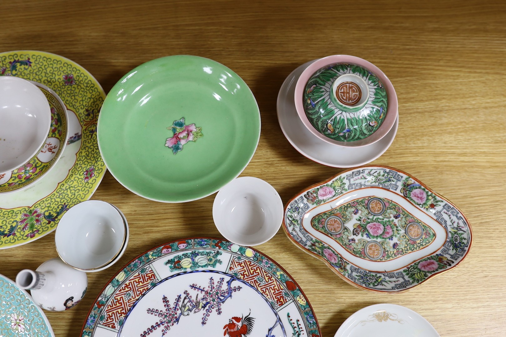 A group of Chinese enamelled porcelain plates, dishes, covers, cups and a vase